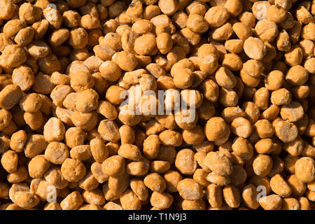 Pure cane sugar pebbles, produced by traditional methods in rural India Stock Photo