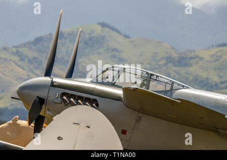 de Havilland DH.98 Mosquito fighter plane at Hood Aerodrome. Second World War RAF fighter bomber with Wairarapa hills, New Zealand Stock Photo