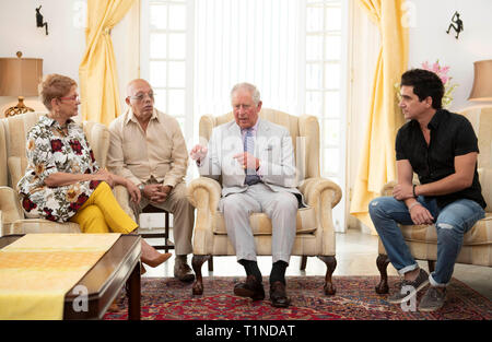 The Prince of Wales hears about the cultural response to the recent tornado in Havana, at the Ambassador Residence in Havana, Cuba. Stock Photo