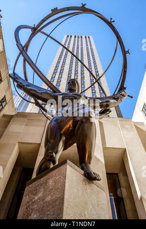 Bronze statue Atlas, depicts the Ancient Greek Titan holding the heavens in the forecourt of Rockefeller Center, Midtown Manhattan, New York. Mar 2018 Stock Photo
