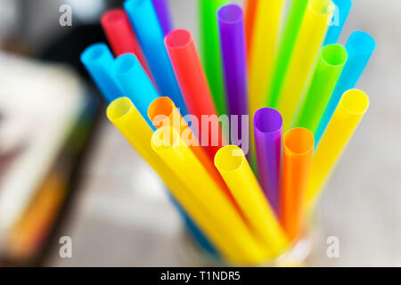 Top view of bright colorful plastic drinking straws and tubes Stock Photo