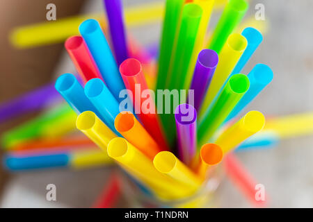 Top view of bright colorful plastic drinking straws and tubes Stock Photo