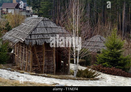 Archaeological park Topolnitsa with neolithic houses reconstruction for relax and traditional celebrate near village Chavdar, Sofia, Bulgaria, Europe Stock Photo