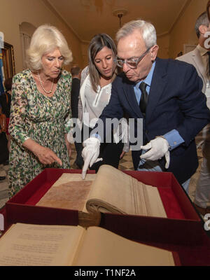 The Duchess of Cornwall looks at the signature of her relative, George Keppel the 3rd Earl of Albemarle in a book as she attends a reception at the Palacio de los Capitanes Generales in Havana, Cuba. Stock Photo