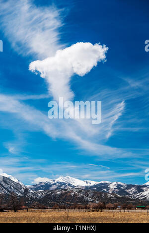 Unusual cloud formations against cobalt blue sky over Rocky Mountains; central Colorado; USA Stock Photo