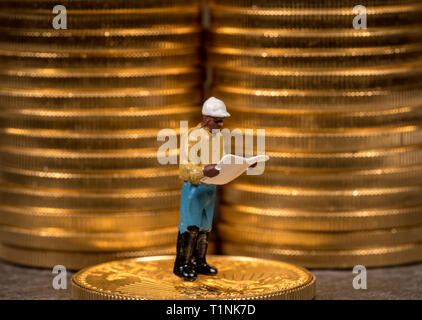 Concept of investment in gold with US Treasury Gold Eagle coins Stock Photo