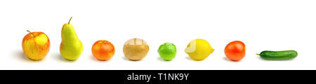 Close-up of Various Fruits in a row isolated on white Background. View of a healthy and Colorful Fruit Mix. Mixture of Fruits and Vegetables. Stock Photo