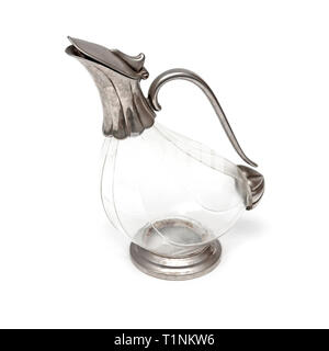 Elegant transparent glass jug with waterproof metal handle on a white background Stock Photo