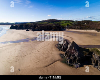 Aerial view of Three Cliffs Bay south coast beach the Gower Peninsula Swansea Wales uk Stock Photo