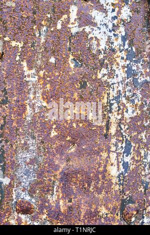 Abstract multicolored rusty metal background or corroded metal texture. Stock Photo