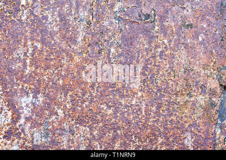 Abstract multicolored rusty metal background or corroded metal texture. Stock Photo