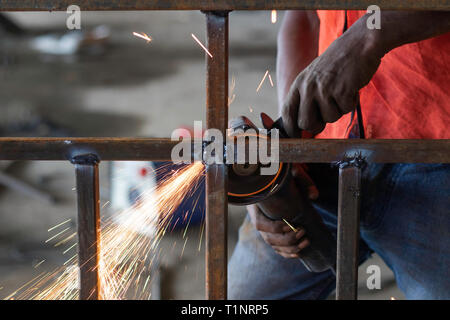 Labor cutting metal Stock Photo
