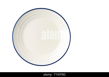 White plate with a blue stripe on the edge. Isolate View from above Stock Photo