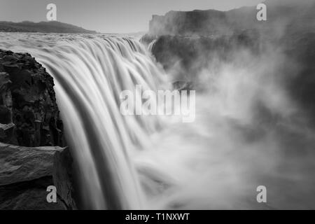 Dramatic black and white landscape of Dettifoss, the biggest waterfall in Iceland Stock Photo