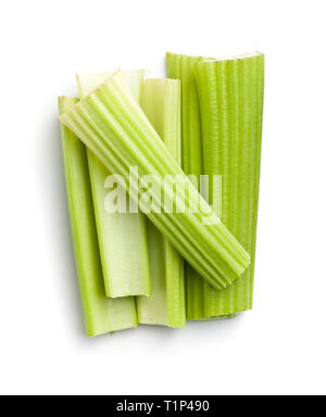 Celery sticks. Cutting celery stalks isolated on white background. Stock Photo