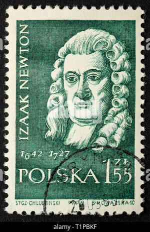 Isaac Newton,  English mathematician, physicist, astronomer, portrait on a vintage, canceled post stamp from Poland (circa 1959). Stock Photo