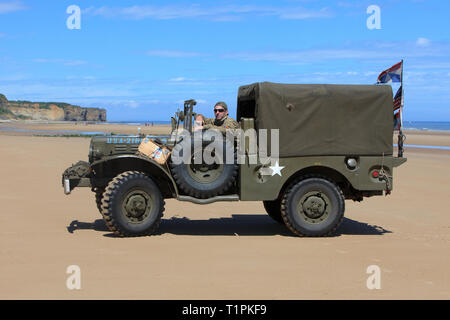 A Dodge WC-51 weapons carrier at Omaha Beach during the D-Day celebrations in Normandy, France Stock Photo