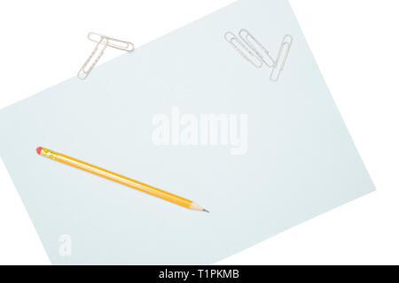 One whole yellow pencil on a paper sheet with paper clips flatlay isolated on white background Stock Photo