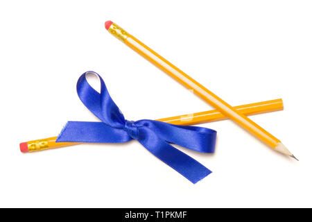 Group of two whole yellow pencil tied by ribbon flatlay isolated on white background Stock Photo