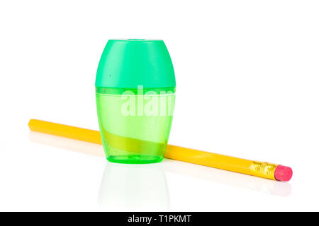 One whole yellow pencil with pencil sharpener isolated on white background Stock Photo