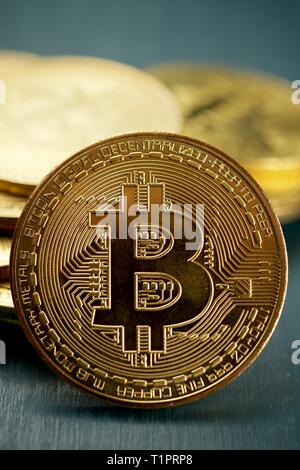 Bitcoins on a wood table. Stock Photo