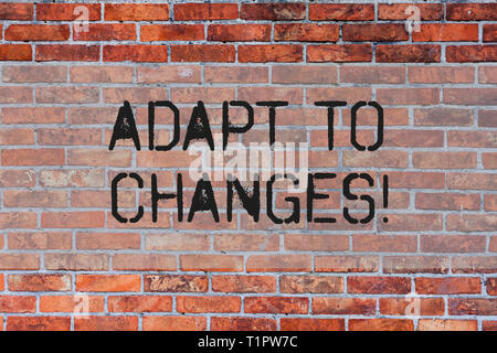 Handwriting text Adapt To Changes. Conceptual photo Innovative changes adaption with technological evolution Brick Wall art like Graffiti motivational Stock Photo