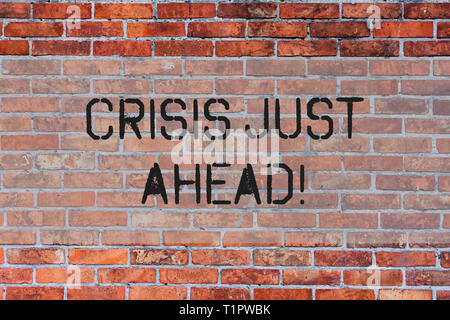 Handwriting text Crisis Just Ahead. Conceptual photo Foresee failure take right action before it is late Brick Wall art like Graffiti motivational cal Stock Photo