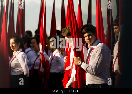 Izmir, Turkey - October 29, 2018: Turkish flag carrying students at festival of Republic Day of Turkey. Stock Photo