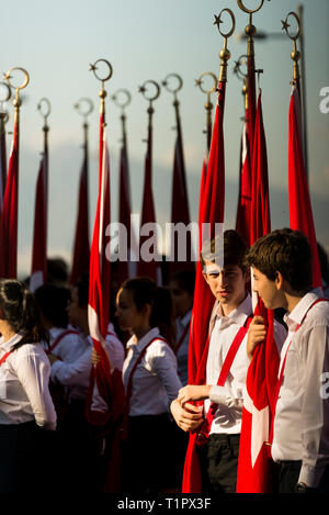 Izmir, Turkey - October 29, 2018: Turkish flag carrying students at festival of Republic Day of Turkey. Stock Photo