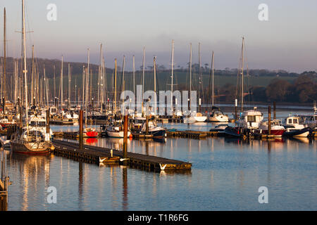 Crosshaven, Co. Cork, Ireland. 28th March, 2019. Early morning light begins to illuminate the yachts on the  marina at the Royal Cork Yacht Club in Crosshaven, Co. Cork, Ireland.- Picture David Creedon / Anzenberger Credit: David Creedon/Alamy Live News Stock Photo