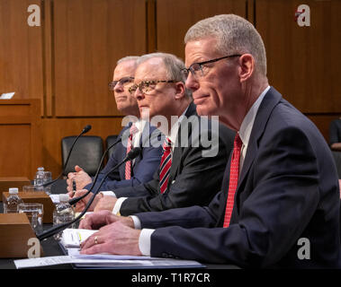 From left to right: Daniel Elwell, Acting Administrator, Federal Aviation Administration (FAA); Calvin Scovel, Inspector General, Department of Transportation; and Robert Sumwalt, Chairman, National Transportation Safety Board (NTSB), testify before the United States Senate Committee on Commerce, Science, and Transportation Subcommittee on Aviation and Space, during a hearing titled, 'The State of Airline Safety: Federal Oversight of Commercial Aviation' to examine problems with the Boeing 737 Max aircraft highlighted by the two recent fatal accidents. Credit: Ron Sachs/CNP | usage worldwide Stock Photo