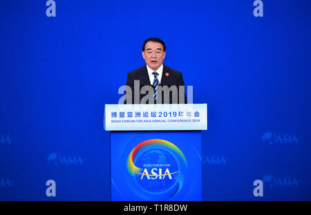 (190328) -- BOAO, March 28, 2019 (Xinhua) -- The Boao Forum for Asia (BFA) Secretary General Li Baodong presides over the opening plenary of the Boao Forum for Asia annual conference in Boao, south China's Hainan Province, March 28, 2019. (Xinhua/Guo Cheng) Stock Photo