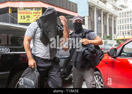 Sao Paulo, Brazil. 28th Mar, 2019. SP - Sao Paulo - 03/28/2019 - Light Child Operation 4 - Light Child Operation 4, which combats pedophilia enters the fourth phase, with 266 search and seizure mandates and prison sentences throughout Brazil. In Sao Paulo prisoners and seized material goes to the DHPP in the center of the capital. Photo: Suamy Beydoun/AGIF Credit: AGIF/Alamy Live News