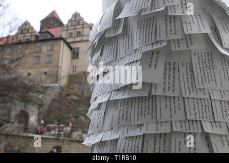28 March 2019, Saxony-Anhalt, Quedlinburg: A paper installation with quotations of well-known poets is attached to the Klopstockhaus in the entrance area. The Klopstockhaus Quedlinburg starts the spring season on 3 April 2019 with a newly designed permanent exhibition. The biographical-literary-historical museum gives an impression of the life and work of the poet Friedrich Gottlieb Klopstock as well as of the first doctor of medicine, Dorothea Christiana Erxleben, and the sports pedagogue GutsMuths. The three Quedlinburg personalities each made a momentous contribution to the Enlightenment. T Stock Photo