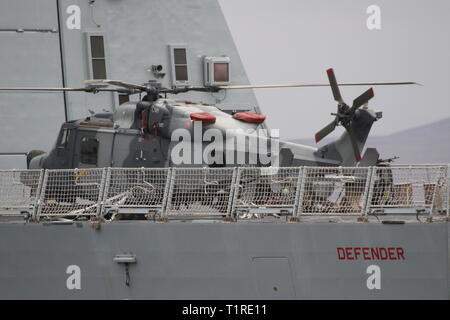 ZZ396, an AgustaWestland AW159 Wildcat HMA2 operated by the Royal Navy, carried on board HMS Defender (D36), a Daring-class (Type 45) destroyer. Stock Photo