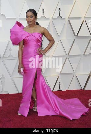 Actress Angela Bassett wearing a dress by designer Carmen Marc Valvo walks the runway during the Red Dress Heart Truth dress collection during Fashion Week in New York Friday Feb. 2 2007