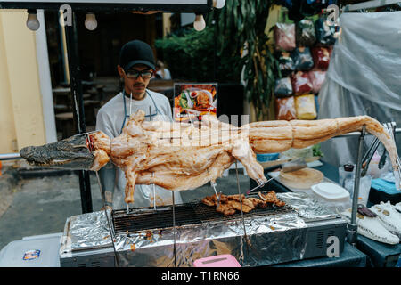 Crocodile to eat on a barbecue grill in Bangkok, Thailand Stock Photo