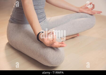 Teen Girl Meditating in Turkish Sitting Position Closeup Stock Photo