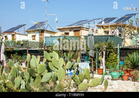 Small houses of fishermen is a group of 31 houses permanently inhabited all year round, is amazing architecture, Alboraya, Valencia Spain beach houses Stock Photo