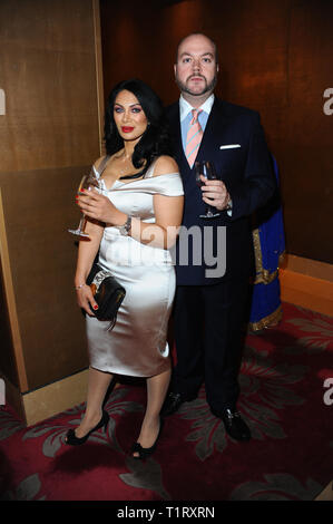 Janine Nerissa and Jonathan Sothcott are seen during the UK Asian Film Opening Gala at the Mayfair Hotel in London. Stock Photo