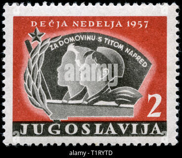 Postage stamp from the former state of Yugoslavia in the Children's Week series issued in 1957 Stock Photo