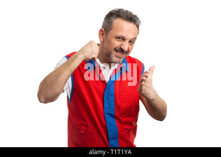 Angry male supermarket or hypermarket employee starting with intimidating gesture made by using fist and palm isolated on white Stock Photo