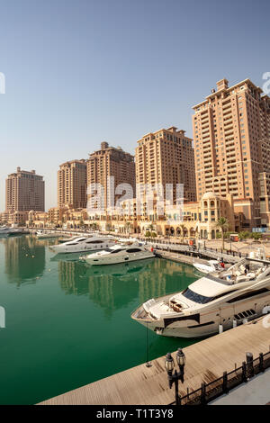 DOHA, QATAR – SEPTEMBER 06 2013: Mediterranean-style towers in The Pearl Qatar Stock Photo