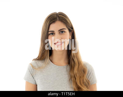 Portrait of a attractive and cheerful young teenager woman with happy face smiling. Studio shot isolated on white. In People, human emotions and expre Stock Photo