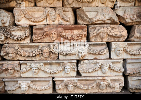 Roman sculpted frieze blocks with garland relief sculptures, North Portico, Aphrodisias Archaeological Site, Aydin Province, Turkey. Stock Photo