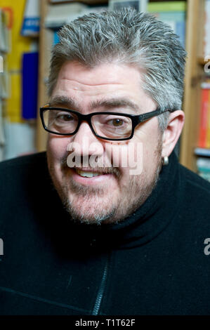 UK comedian, latterly radio DJ Phill Jupitus pictured at Camden Lock Books reading from his  new book 'Good Morning Nantwich.' -  Picture By: Nick Cunard / Retna Pictures  90476    NCD - *World Rights* Stock Photo