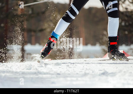 cross-country ski race legs man athlete skier Stock Photo