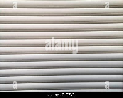 Metal Blinds with drawstring. Roller Shutter Background. Stock Photo