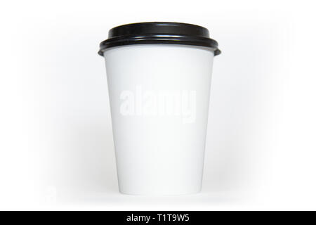 A white coffee cup with black lid isolated on a white background. Stock Photo