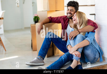 Couple enjoying their new luxurious home Stock Photo